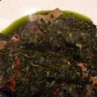 Sautéed Spinach · Fresh-cut collard greens with fried fish, chicken, beef, bell peppers and onions with a choi...