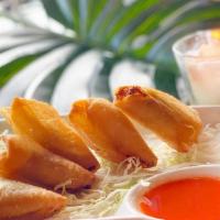 Burmese Gold Samosas · Crispy triangles filled with delicious stuffing made of potatoes, carrots and peas. Sizzled ...