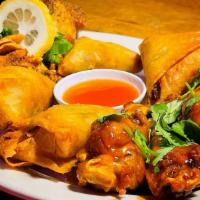 Wings & Samosas Platter · Our popular sampler plate of Golden Samosas and Burmese Wings. Choose any 3 combinations of ...