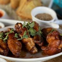 Tamarind Hot Wings · Beaverton Exclusive. Burmese Home Style Tumeric fried chicken wings 