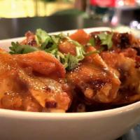 Sweet Mango Wings · Burmese homestyle chicken wings marinated with House Mango chutney. Juicy, sweet, and tangy....
