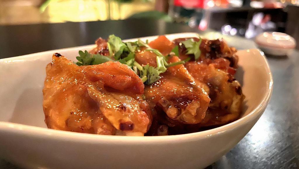 Sweet Mango Wings · Burmese homestyle chicken wings marinated with House Mango chutney. Juicy, sweet, and tangy. (DF, NF, GF)