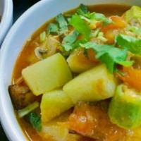 All-Star Okra Curry (Vegan Option). · Authentic locals' favorite. Okra, Chayote Squash, Sliced Button Mushrooms, Eggplant, and Tom...