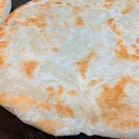 Pan Toasted Paratha. · A slice of pan-toasted Paratha.