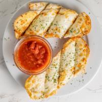 Garlic Cheese Bread · Served with our homemade marinara sauce.
