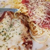 Chicken Parmigiana · Tender chicken breast, lightly breaded and topped with our homemade marinara sauce and five ...