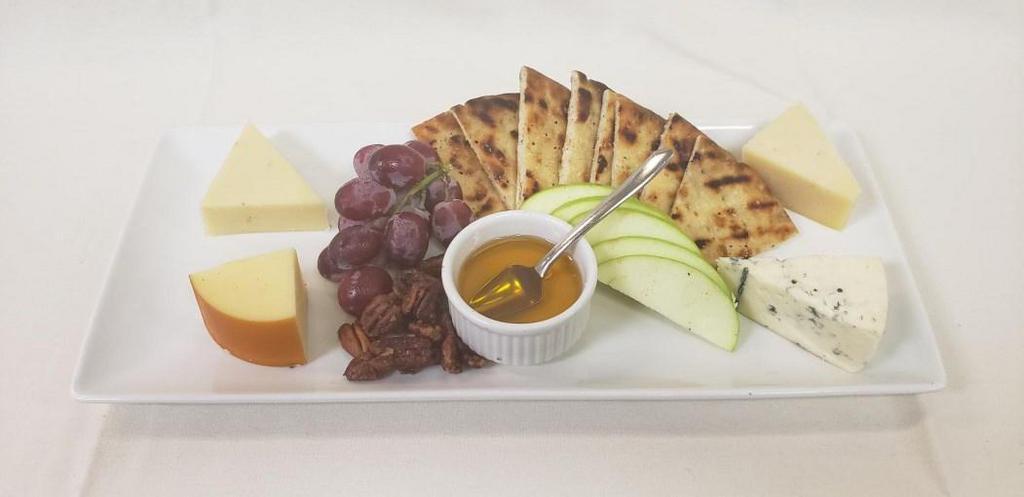 Gourmet Cheese Plate · Chef's selection of four gourmet cheeses
