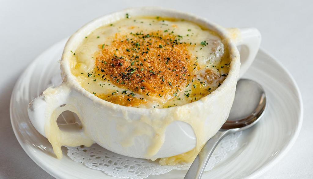 French Onion Soup · Caramelized five onion mix, rich broth, croutons, Gruyère cheese