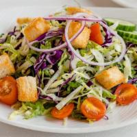 Eddie'S House Salad · Mixed greens, tomato, cucumbers, red onion, croutons