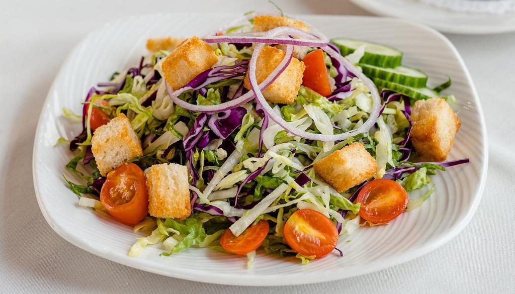 Eddie'S House Salad · Mixed greens, tomato, cucumbers, red onion, croutons
