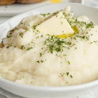 Mashed Potatoes · Roasted garlic, cream, butter