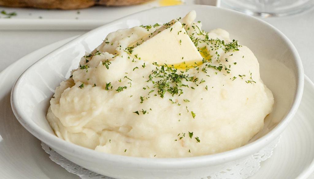 Mashed Potatoes · Roasted garlic, cream, butter