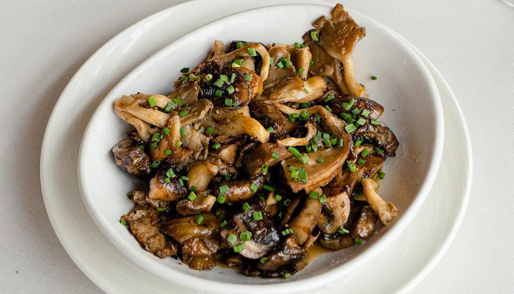 Wild Mushrooms · Shiitake, cremini, oyster mushrooms, garlic, butter