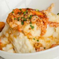 Lobster Mashed Potatoes · Garlic mashed potatoes, lobster meat, lobster butter, chives.