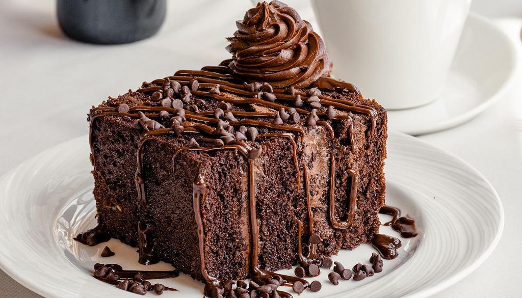 Triple Chocolate Cake · Chocolate butter cream icing, chocolate chips