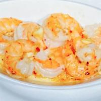 Garlic Or Creole Prawns · Prawns sauteed with either fresh chopped garlic and butter or creamy creole seasoning.