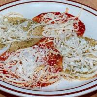 Chalupas Poblanas (4) · Fried corn tortillas served open faced with red and green sauce, cotija cheese and shredded ...