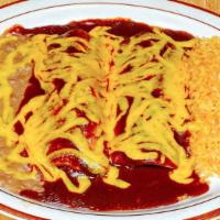 Enchiladas (2) · Two corn tortillas filled with beef, chicken, cheese or pork. Served with rice & beans.