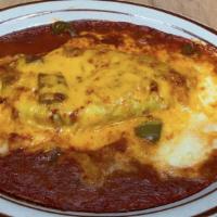 Chile Relleno · Roasted poblano pepper stuffed with jack cheese.
