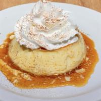 Flan · Spanish style custard with caramel syrup & whipped cream.