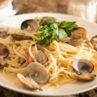 Linguine Clams · clams, garlic, white wine sauce, and parsley.