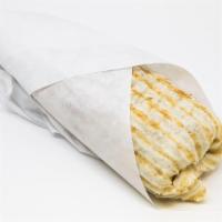 Lamb & Beef Gyro Wrap · Served with lettuce, tomatoes, onions, cucumber and parsley. Served with tzatziki sauce.