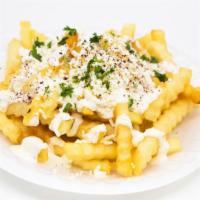 Greek Fries · Fries topped with feta cheese, tzatziki sauce, and kalamata olives.
