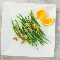 Garlic French Beans · Vegan, gluten-free. Crisp French beans sautéed with a healthy serving of garlic.