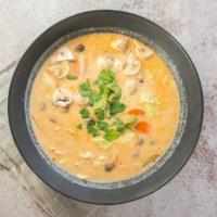 Tom Kar (Thai Coconut Milk Soup) · Your choice chicken, pork or tofu, galangal, lemongrass, kaffir lime leaves, red onion, cabb...