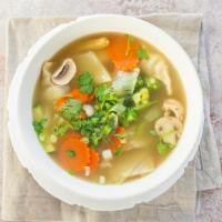 Dumpling Soup · Your choice of chicken or vegetarian dumplings, onion, cabbage, carrots, broccoli, zucchini,...