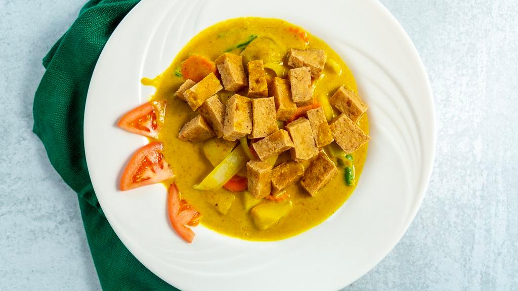 Yellow Curry · Yellow curry paste, coconut milk, turmeric, onion, carrot, potatoes. tomato, and green onion.