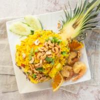 Pineapple Fried Rice · Jasmine rice, turmeric, onion, carrot, pineapple, bell pepper, green onion, cilantro, cashew...