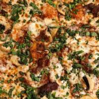 Quattro Stagioni Pizza · Prosciutto, mushrooms and mozzarella cheese. Served with choice of sauce.