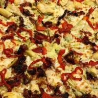 Pesto Gourmet Pizza · Pesto olive oil base, sun-dried tomatoes, roasted red peppers, artichoke hearts, goat cheese...