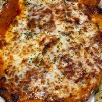 Lasagna Primavera · Beef or veggie lasagna baked with mozzarella and Parmesan cheese in marinara sauce.