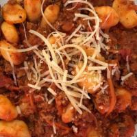 Gnocchi Al Sugo Carne · Gnocchi topped with homemade meat sauce.