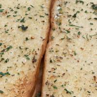 Garlic Bread · Fresh bread seasoned with garlic, butter and spices. Homemade marinara sauce.