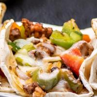 Taco Alambre · served in flour tortilla come with choice of meat, bacon, bell pepper, onions and melted che...