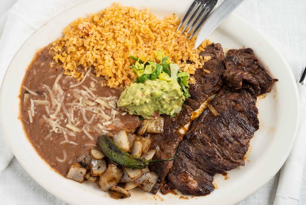Carne Asada · out side skirt steak served with guacamole,  rice, beans, grill onions  and jalapeno and tortillas on the side