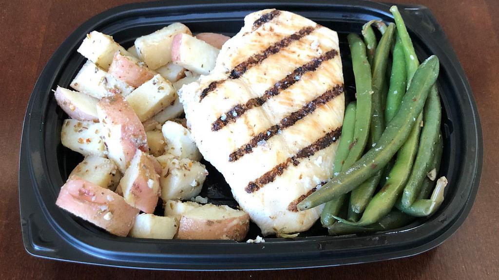 Chicken Breast With Red Potato & Green Bean Meal · Boneless chicken breast with roasted red potatoes and green beans.