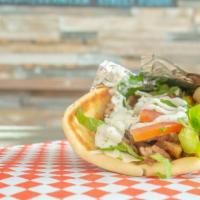 Gyro With  Tzatziki Sauce · Rolled in a pita with lettuce, tomatoes, and onions.