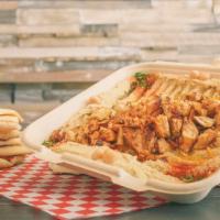 Meaty Hummus & Pita · Topped with choice of Gyro or Chicken Shawarma. Served with 2 Pitas.