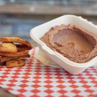 Chocolate Hummus And Pita · Garbanzo dip prepared with Tahini, Chocolate and Vanilla Extract. Served with 1 Deep Fried C...