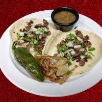 #21. Taco (X1) · Serve in handmade tortillas with onions, cilantro and salsa.