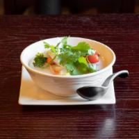 Tom Kha · Gluten-free, vegetarian. Creamy coconut milk soup with mushroom, cilantro, lemongrass, galan...