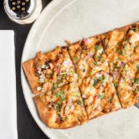Bbq Chicken Flatbread · Diced chicken breasts atop a layer of sweet barbecue sauce with mozzarella, diced red onion ...