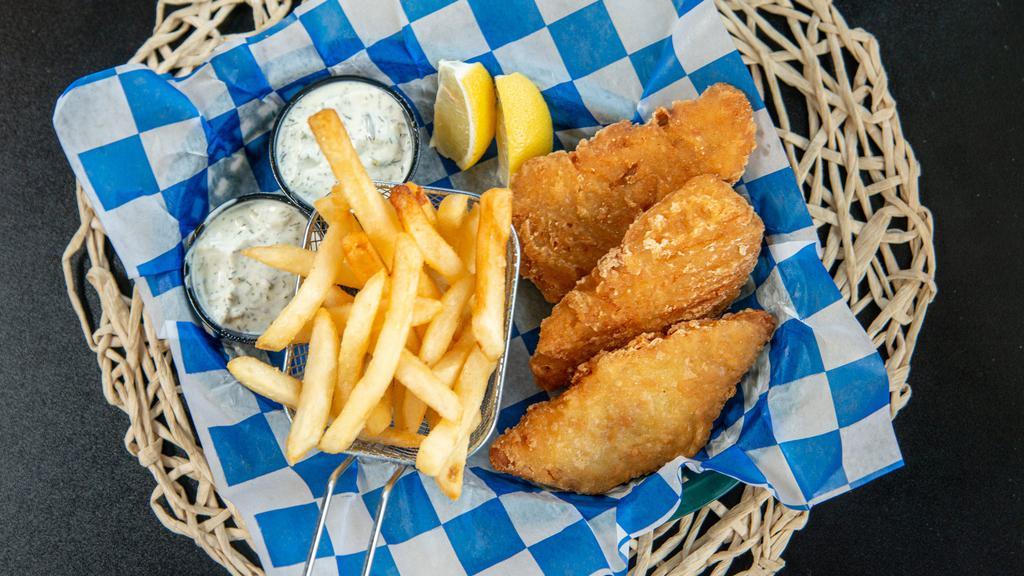 Fish N' Chips · Three Alaskan cod fillets battered and fried til golden, served atop a pile of fries with tartar sauce for dippin'.