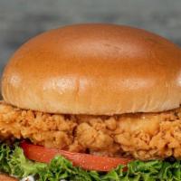Crispy Chicken Sandwich · Southern fried chicken breast with all the fixings on a brioche bun.
