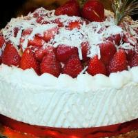 Strawberry Shortcake · Soft angel caked topped with succulent strawberries and whipped cream.