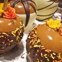 Carmel Apples · Juicy Granny Smith Apples topped with Carmel.
